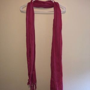 Light pink scarf with tasseled ends